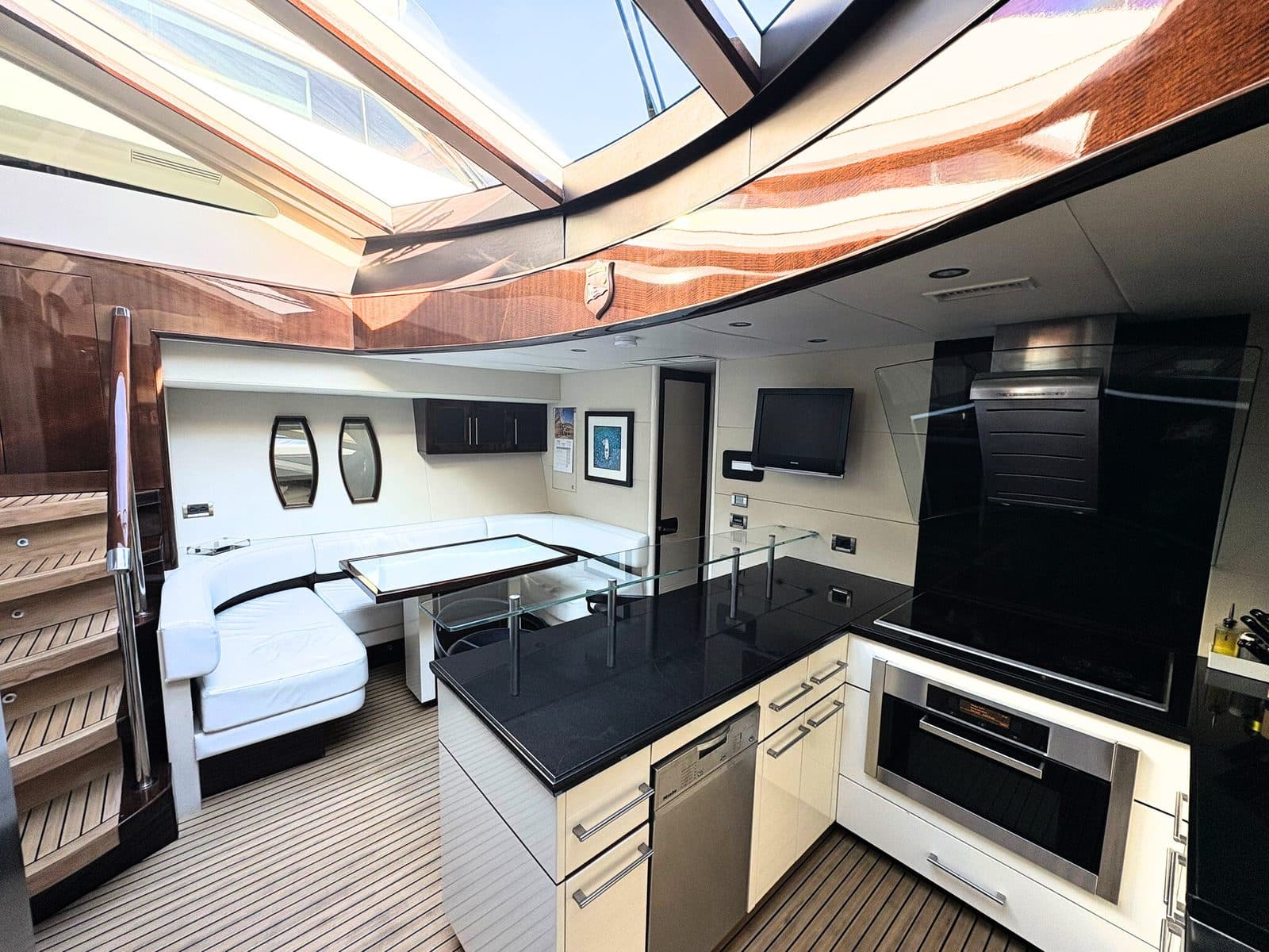 Side deck of Sans Regret in the Mediterranean light